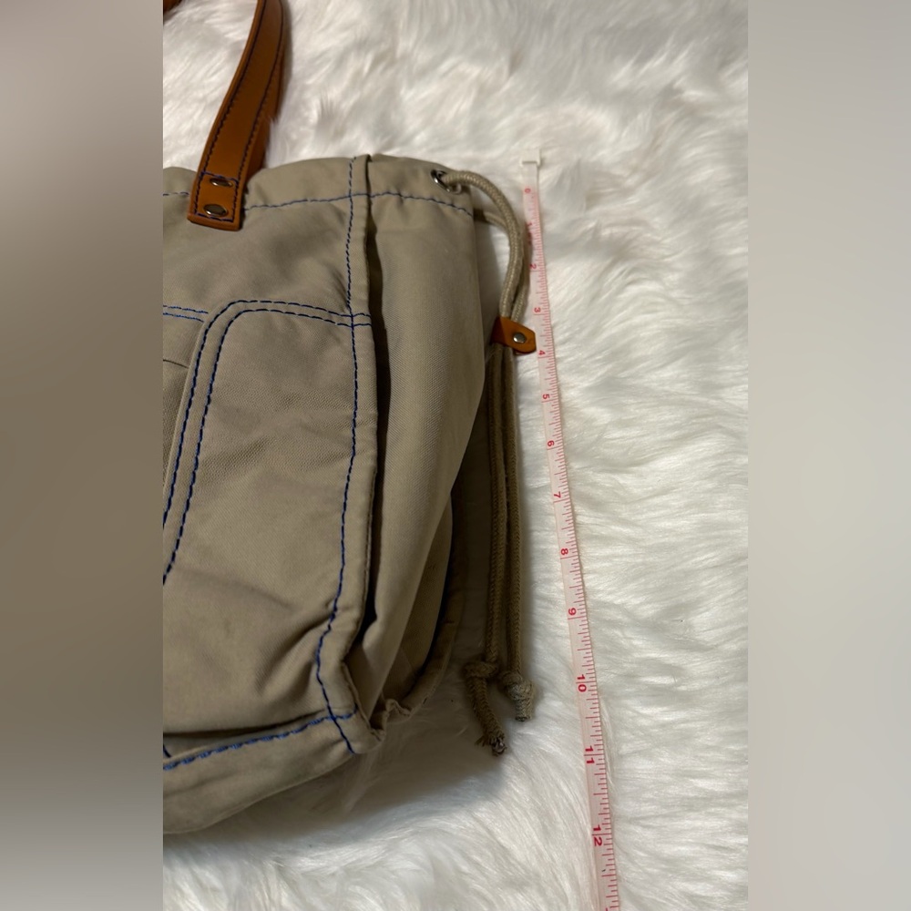 Lacoste Beige Canvas Sportsman Drawstring Tote with Tan Leather Handles - Picture 13 of 14